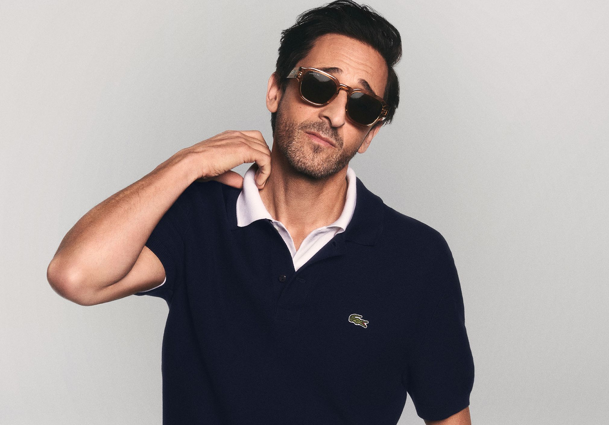 Lacoste Advertising sun style The New Icon couple shot. Style: L6056S in colors 749 and 315.